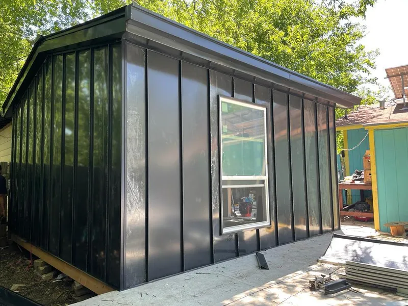 Black standing seam metal wall panels for Metal Roof Installation in Olyphant