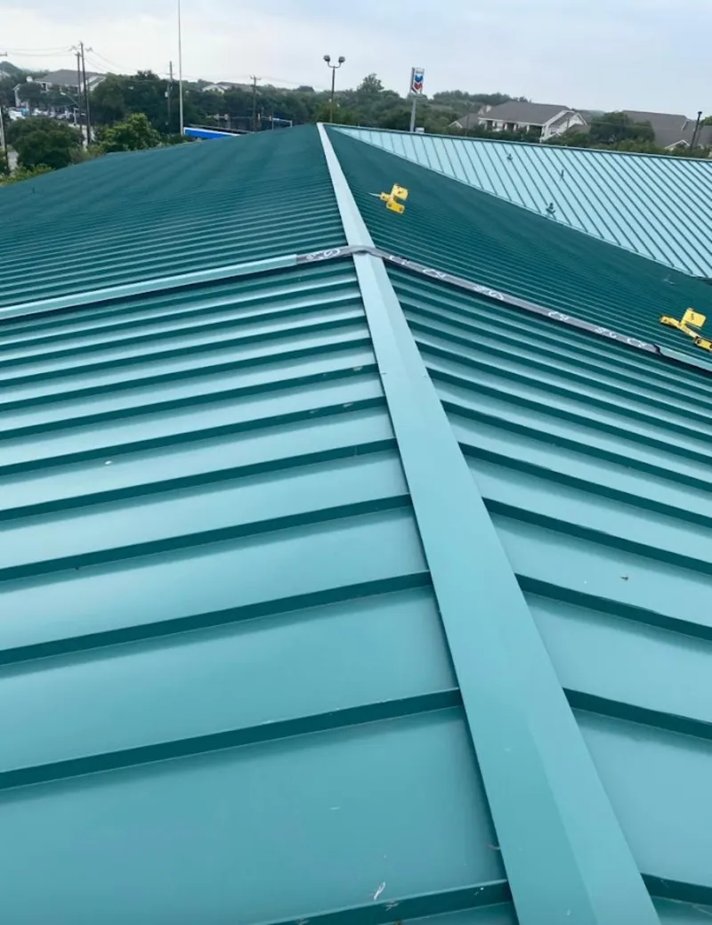 Green commercial metal roof ridge and valley for Metal Roof Repair in Olyphant